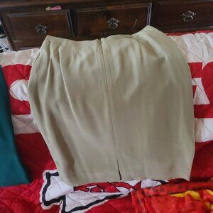 100% silk dress jacket matching skirts. From a smoker's house.